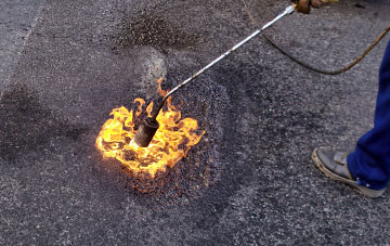 Patching flat roofing repairs